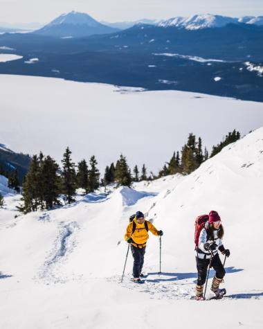 People snowshoeing up Mount White