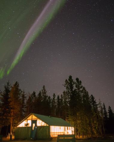 The aurora dancing over the sky