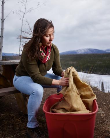 Geri-lee of FNNND tanning a moose hide.