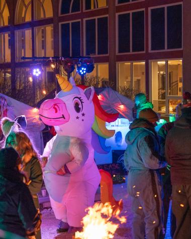 People dancing outside at Glacier Nights Festival. 