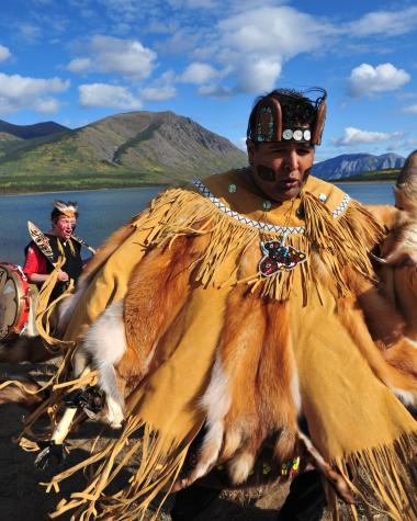Dancers perform in regalia