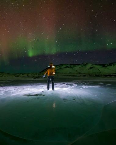 mather_aurora_person_lake_ice_night_sky_icej.jpg