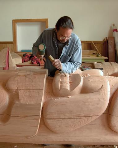 Keith Wolfe Smarch carving in his shed