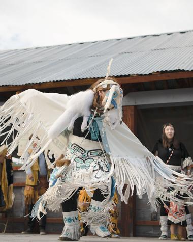 A dancer performs at Moosehide